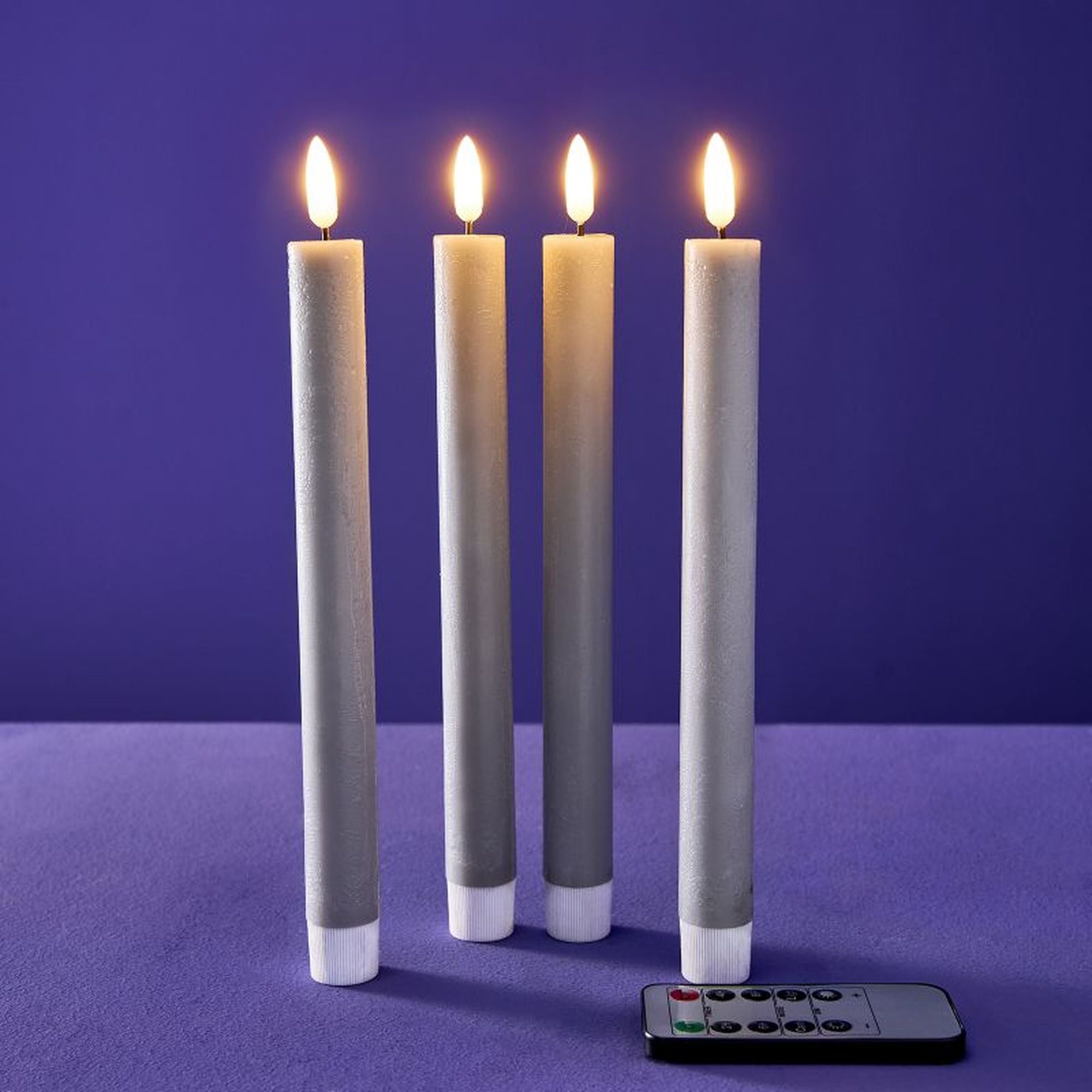Set 4-teilig - LED Stabkerze - Echtwachs/Kunststoff/LED - H. 24.5 cm - m. Fernbedienung
